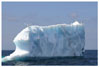 icebergs and fishing boat at dusk